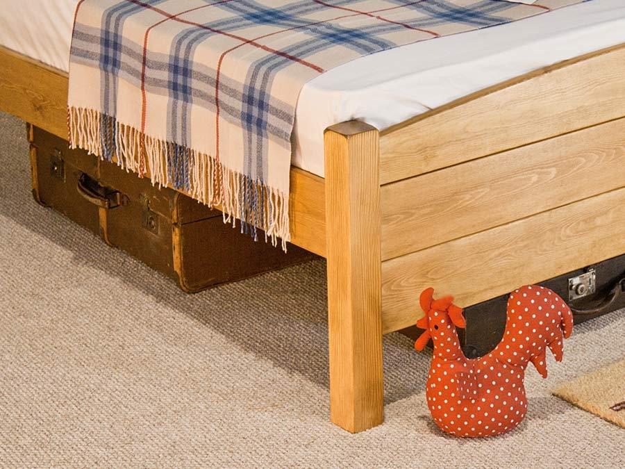 traditional wooden country bed side